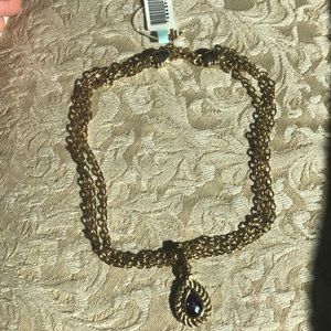 Fox’s purple stone necklace